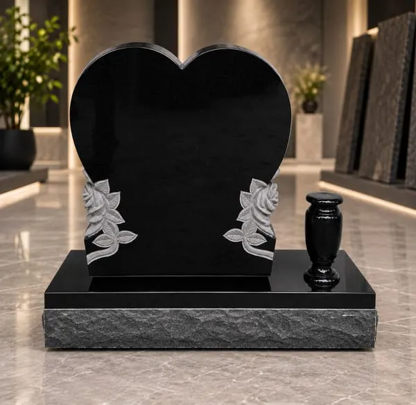 Heart monument with carved side design